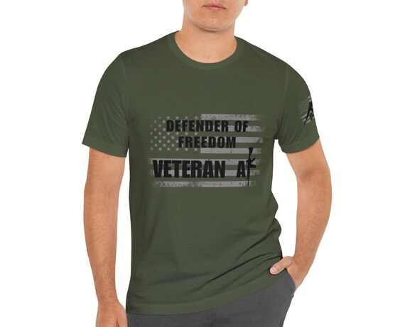 Veteran AF with Patriotic Flair: American Flag Bella Canvas Tee with Rifle Font - Must-Have for Service Members