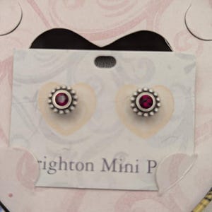 May include: A trio of ceramic mugs with a speckled, matte finish in blue, green, and white. Each mug has a rounded handle and a simple, modern design. Suitable for tea or coffee, these mugs offer a minimalist aesthetic.