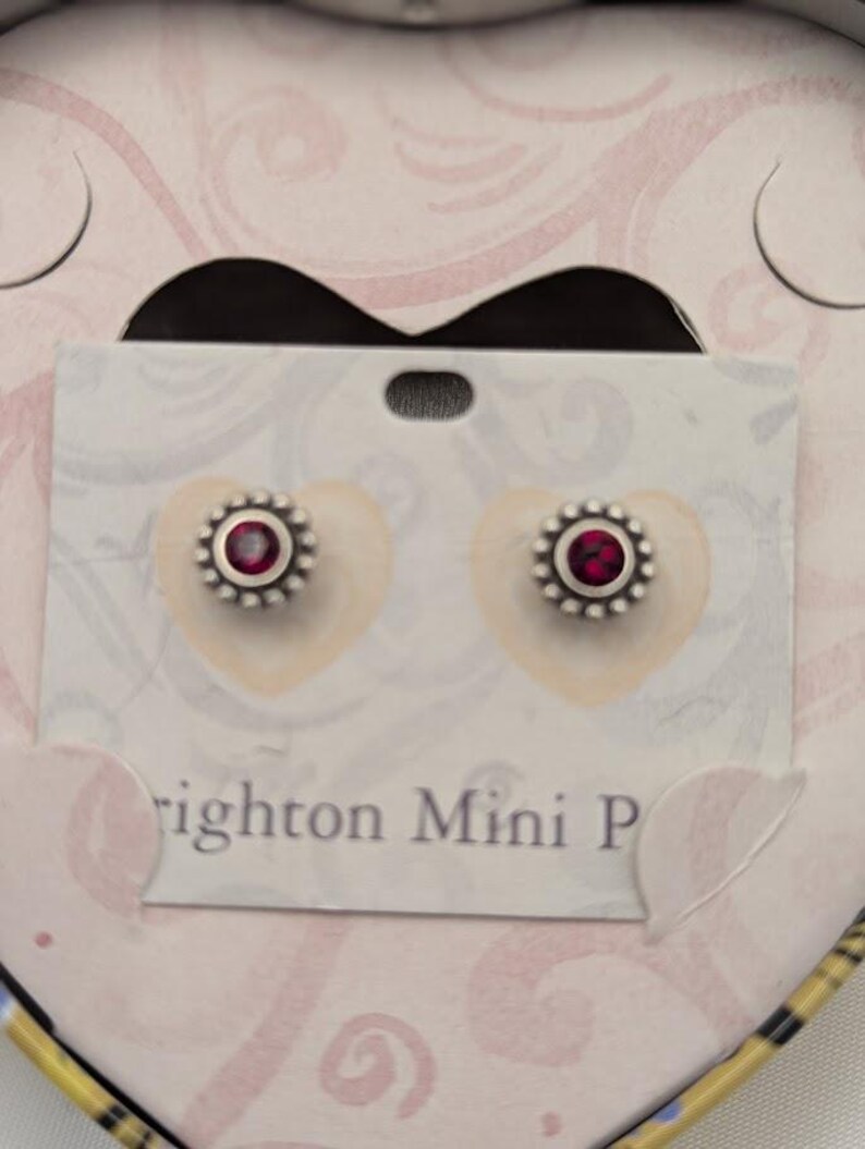 May include: A trio of ceramic mugs with a speckled, matte finish in blue, green, and white. Each mug has a rounded handle and a simple, modern design. Suitable for tea or coffee, these mugs offer a minimalist aesthetic.