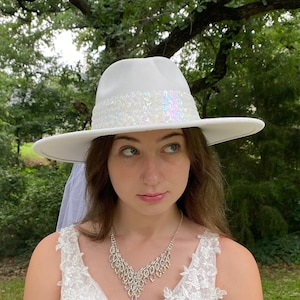 Wedding fedora hat white felt with hatband of white and iridescent sequins. One of a kind. the 32 inch veil is two shear layers.