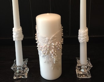 Wedding three piece beautiful pearl and lace wedding unity candle set piller candle has pearls and lace tapers have pearls and lace.