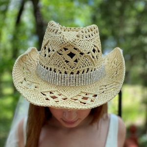 Cowboy western bride hat with wide rhinestone hat band embellished with satin flowers with rhinestone centers and a 36&quot; veil