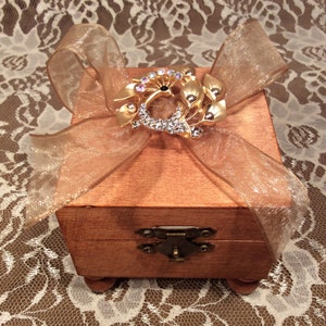Musical jewelry/trinket box with gold and rhinestone peacock detachable pin. available with or without music. made in texas