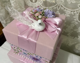 Wedding Card Box is Covered in Pink Velvet with Pastel Flowers and Leaves with Pink Satin Ribbons with Pastel Flower and a White Dove
