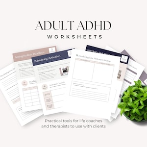 May include: A selection of worksheets for adult ADHD, including titles such as "Setting Realistic Deadlines" and "Maintaining Motivation." These are designed for life coaches and therapists. A small green plant in a pot is also visible.