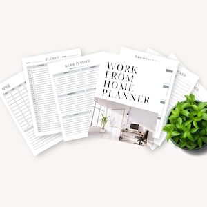 A workspace planner featuring a cover labeled 'Work From Home Planner' alongside printed schedule sheets for planning tasks and a potted green plant, set against a light background.