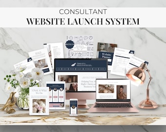 May include: A Consultant Website Launch System kit featuring a desktop monitor, laptop, tablet, and smartphone displaying website designs, alongside printed planner pages, a bonus icon sheet, a gold bird figurine, and a rose gold desk lamp.