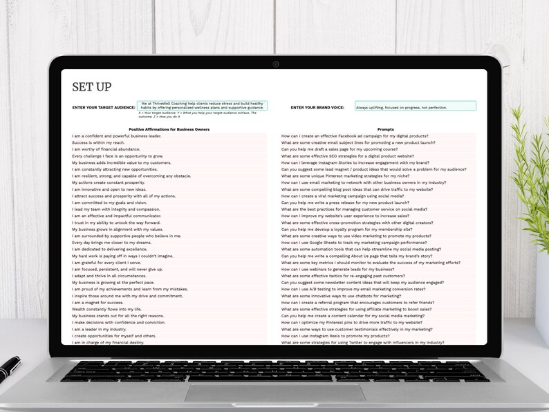 A laptop displaying a document titled 'SET UP' featuring sections on positive affirmations for business owners and prompts for marketing strategies. A green plant is partially visible beside the laptop.