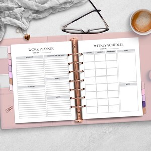 An open work planner displaying a weekly schedule and sections for goals, to-do list, and notes. Surrounding items include glasses, a heart-shaped charm, and a cup of coffee on a light background.