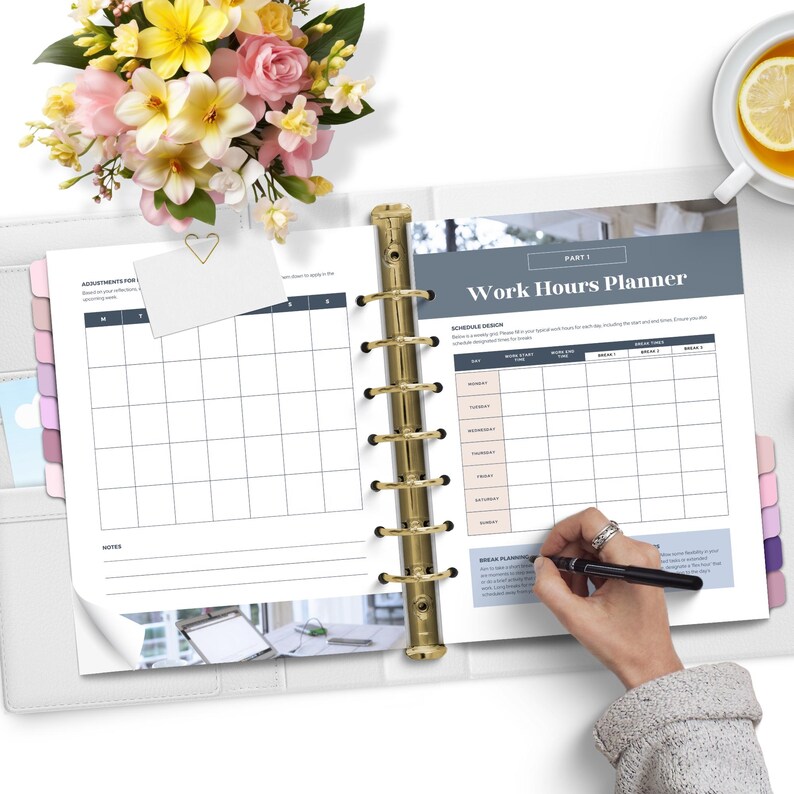 May include: A white and gray planner with a gold binder. The planner has a section for appointments and a section for work hours. The work hours section has a schedule grid with columns for days of the week and rows for hours of the day. The planner also has a section for notes.