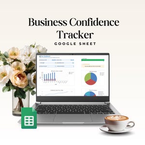 May include: A laptop displaying a Business Confidence Tracker Google Sheet dashboard with charts and data, accompanied by a green Google Sheets icon, a glass vase with white and peach flowers, and a white ceramic cup of coffee on a saucer.