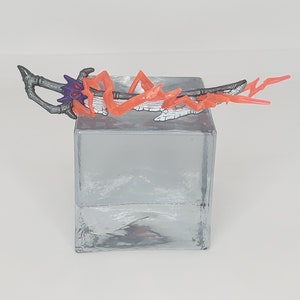 May include: A fantasy-themed weapon with a gray handle and a blade. The handle has a bone-like design with a purple gem and orange energy effects. The blade is gray with white accents.