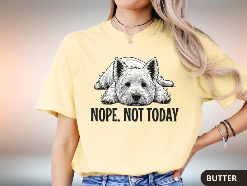 May include: Butter yellow t-shirt featuring a black and white illustration of a West Highland White Terrier dog lying down. The text "NOPE. NOT TODAY" is printed below the dog. The shirt is made of a soft material.