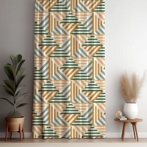 May include: A patterned curtain featuring a geometric design with green, gold, and off-white stripes. The repeating pattern creates a series of diamond shapes. The curtain is hanging in front of a wall, with a potted plant and side table visible.