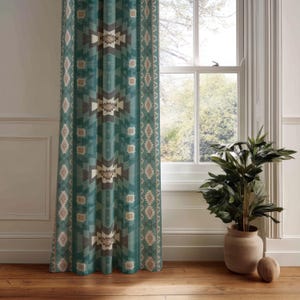 May include: Teal and brown patterned curtain with a geometric design. The curtain hangs in front of a window, with a potted plant on the wooden floor. The pattern includes diamond and rectangular shapes.