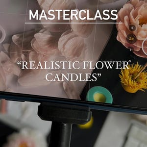 May include: A smartphone screen displaying a masterclass on realistic flower candles. The screen shows various flower candles in different stages of completion, including a pink peony, a coral peony, and a yellow flower. The text "REALISTIC FLOWER CANDLES" is displayed on the screen.