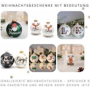 May include: A collection of round glass Christmas ornaments featuring various personalized designs, including names, initials, reindeer, and gnomes. The ornaments are displayed in multiple colors such as green, white, and black with snowflake accents.