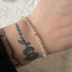 Pulsera de cristal de roca color plata talla ajustable