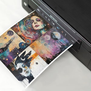 May include: A printer with a colorful abstract print of a woman's face and celestial bodies emerging from the paper tray.
