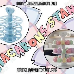 May include: A light blue, three-tiered macaron stand with a heart-shaped handle. The image also shows a filled macaron stand with colorful macarons. Text on the image reads "MACARONS STAND" and "DIGITAL DOWNLOAD STL FILE".