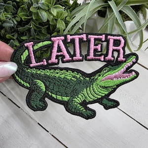 Later Gator embroidered iron on patch.