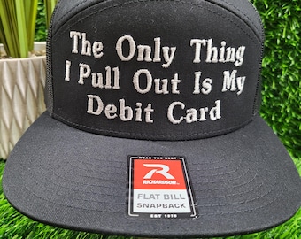 Embroidered Richardson or Lost Curve or flabill snapback with the phrase The Only Thing I Pull Out is My Debit Card