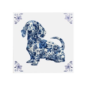 May include: A blue and white dachshund with a floral pattern, reminiscent of Delftware pottery, on a white background.
