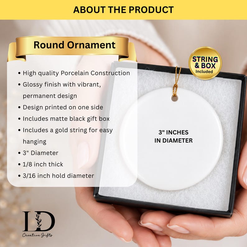 May include: A round white porcelain ornament with a glossy finish, measuring 7.62 cm in diameter and 0.32 cm thick. It features a 0.48 cm hole for hanging, includes a gold string, and is presented in a matte black gift box for display.