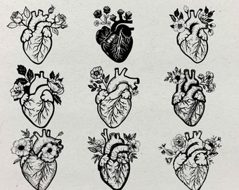 May include: Nine black and white designs of an anatomical heart with floral accents. The heart is stylized with visible chambers and vessels. The floral accents are simple and delicate.