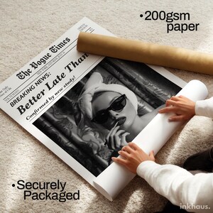 May include: A large poster print on 200gsm paper featuring a black and white image of a person wearing a towel on their head and sunglasses. The print includes the newspaper title The Vogue Times and the headline Breaking News: Better Late Than.