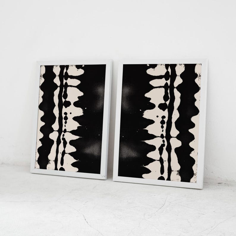 Set of 2 black and white abstract ink drawings inspired by zebra patterns. These modern monochrome paintings feature fluid brushstrokes, creating a minimalist and sophisticated gallery wall. Perfect for Japandi, Scandi, or contemporary home decor, this artistic duo brings elegance and contrast to any living room, bedroom, or office.