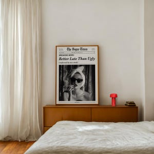 Better Late Than Ugly Vogue Wall Art featuring a chic black and white minimalist design. A trendy vintage decor piece, perfect for stylish homes, dressing rooms, and girls’ bedrooms. Ideal as a quirky and fashionable gift.