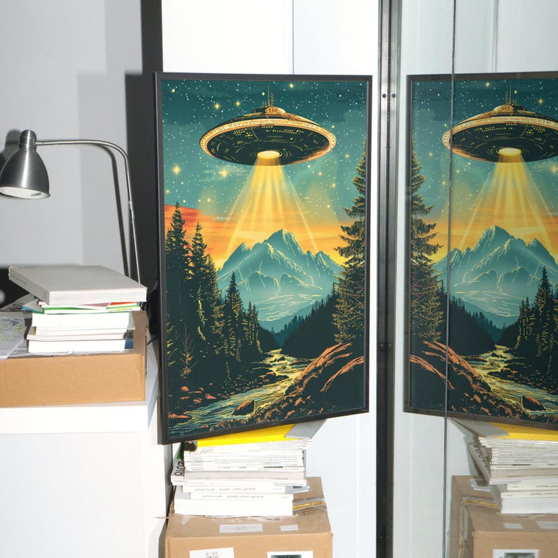 Vintage UFO Wall Art featuring a retro flying saucer illustration with vibrant blue tones, set against a psychedelic alien mountain landscape. This unique and surreal poster brings a cosmic, otherworldly atmosphere to any room, making it the perfect decor piece for sci-fi enthusiasts or those looking for bold, eclectic design. Whether displayed in a living room, bedroom, or office, this striking print adds personality and a conversation-starting element to your home decor.