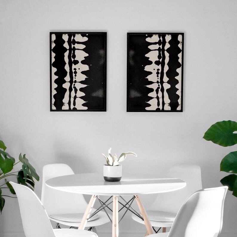 Set of 2 black and white abstract ink drawings inspired by zebra patterns. These modern monochrome paintings feature fluid brushstrokes, creating a minimalist and sophisticated gallery wall. Perfect for Japandi, Scandi, or contemporary home decor, this artistic duo brings elegance and contrast to any living room, bedroom, or office.