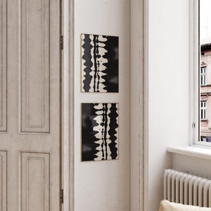 Set of 2 black and white abstract ink drawings inspired by zebra patterns. These modern monochrome paintings feature fluid brushstrokes, creating a minimalist and sophisticated gallery wall. Perfect for Japandi, Scandi, or contemporary home decor, this artistic duo brings elegance and contrast to any living room, bedroom, or office.