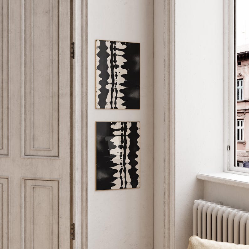 Set of 2 black and white abstract ink drawings inspired by zebra patterns. These modern monochrome paintings feature fluid brushstrokes, creating a minimalist and sophisticated gallery wall. Perfect for Japandi, Scandi, or contemporary home decor, this artistic duo brings elegance and contrast to any living room, bedroom, or office.