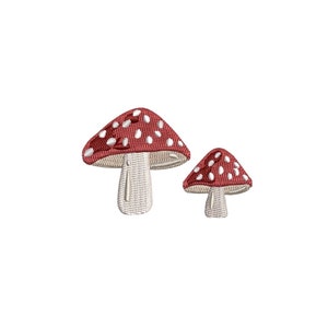 May include: Two red and white mushrooms with white spots. The larger mushroom is on the left and the smaller mushroom is on the right.
