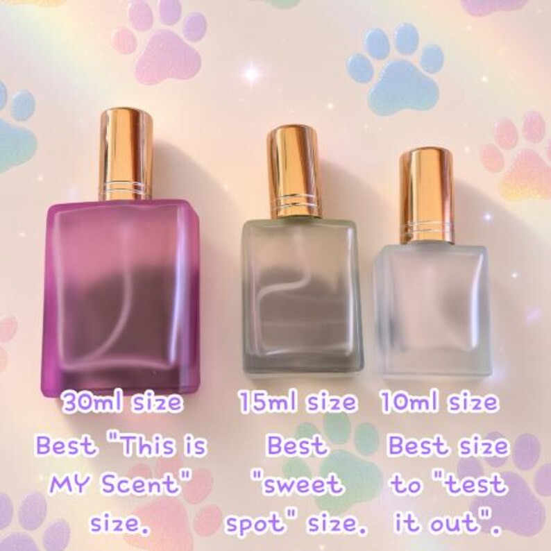 May include: Three rectangular glass perfume bottles with gold caps, arranged by size. The largest is purple at 30ml, the middle is grey at 15ml, and the smallest is clear at 10ml. Text labels indicate the 30ml is the My Scent size, 15ml is the sweet spot size, and 10ml is the test it out size.