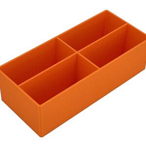 May include: Orange rectangular organiser with four compartments. This storage container is made of a solid, opaque material and is designed to hold and separate various items. The compartments are evenly sized.