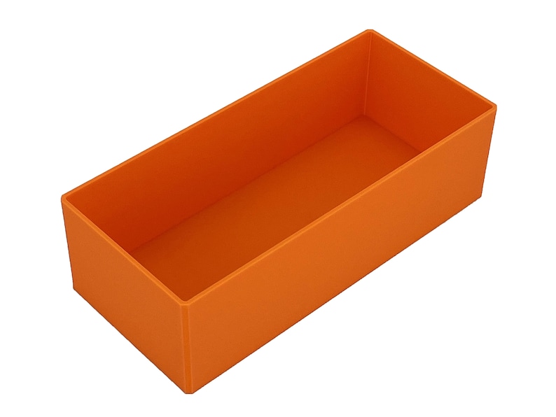May include: An orange rectangular box with a simple, open design. The box is empty and has a matte finish. The sides are straight and the corners are squared. The box is made of a solid material.