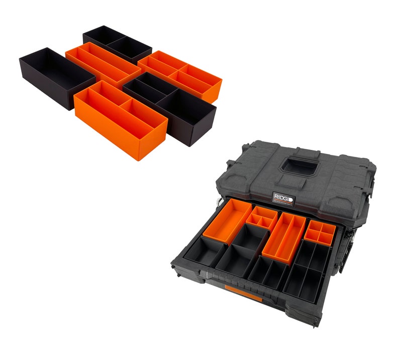 May include: A collection of black and orange storage organisers and a black and grey tool box. The organisers are rectangular and come in various sizes. The tool box has multiple compartments and drawers, with orange and black dividers.