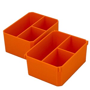 May include: Two bright orange plastic organiser bins. Each bin is divided into three compartments. The bins are designed to hold small items and keep them organised. The bins are made of a durable plastic material.