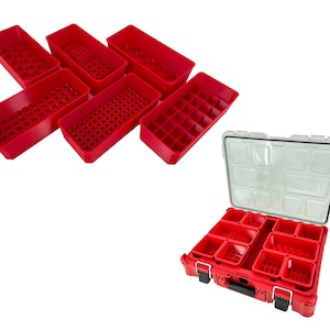 May include: A set of red plastic storage containers with different sized compartments. The containers are designed to fit into a larger red toolbox with a clear lid.