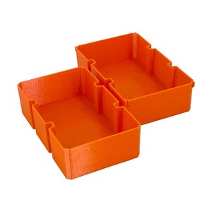 May include: Three bright orange storage bins, designed to interlock. The bins are rectangular with notched sides, and are made of a textured plastic material. The bins are empty and set against a white background.