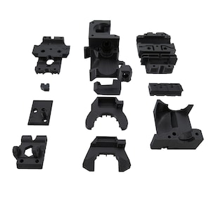 May include: A set of black 3D printed parts for a 3D printer. The parts are made of a durable plastic and are designed to be easy to assemble.