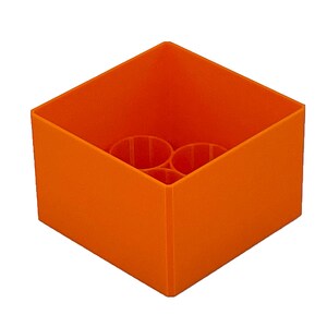May include: Orange plastic storage box with three compartments. The box is empty.