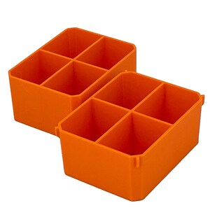 May include: Two bright orange storage bins, each divided into six compartments. The bins are angled and made of a solid, opaque material. Suitable for organising small items in a workshop or craft room.