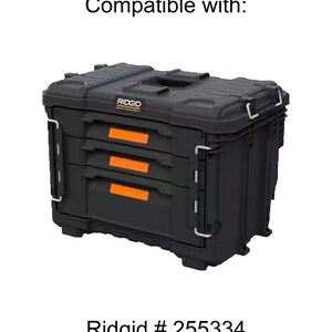 May include: Black tool box with three drawers and the Ridgid logo. Compatible with Ridgid # 255334.