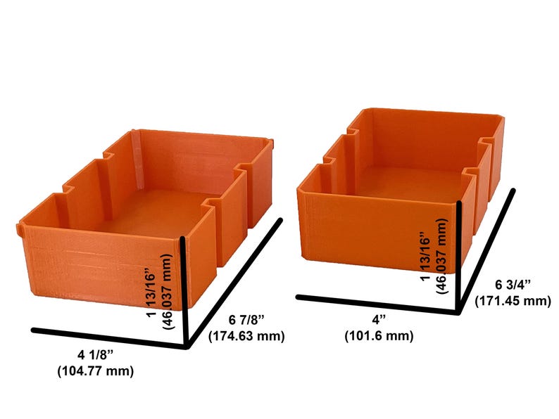 May include: Two orange storage bins. The bin on the left is 4 1/8" (104.77 mm) wide, 6 7/8" (174.63 mm) long, and 1 13/16" (46.037 mm) high. The bin on the right is 4" (101.6 mm) wide, 6 3/4" (171.45 mm) long, and 1 13/16" (46.037 mm) high.