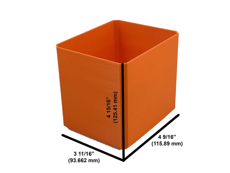May include: An orange square container with dimensions labeled. The height is 4 15/16 inches (125.41 mm), the width is 4 9/16 inches (115.89 mm), and the depth is 3 11/16 inches (93.662 mm).